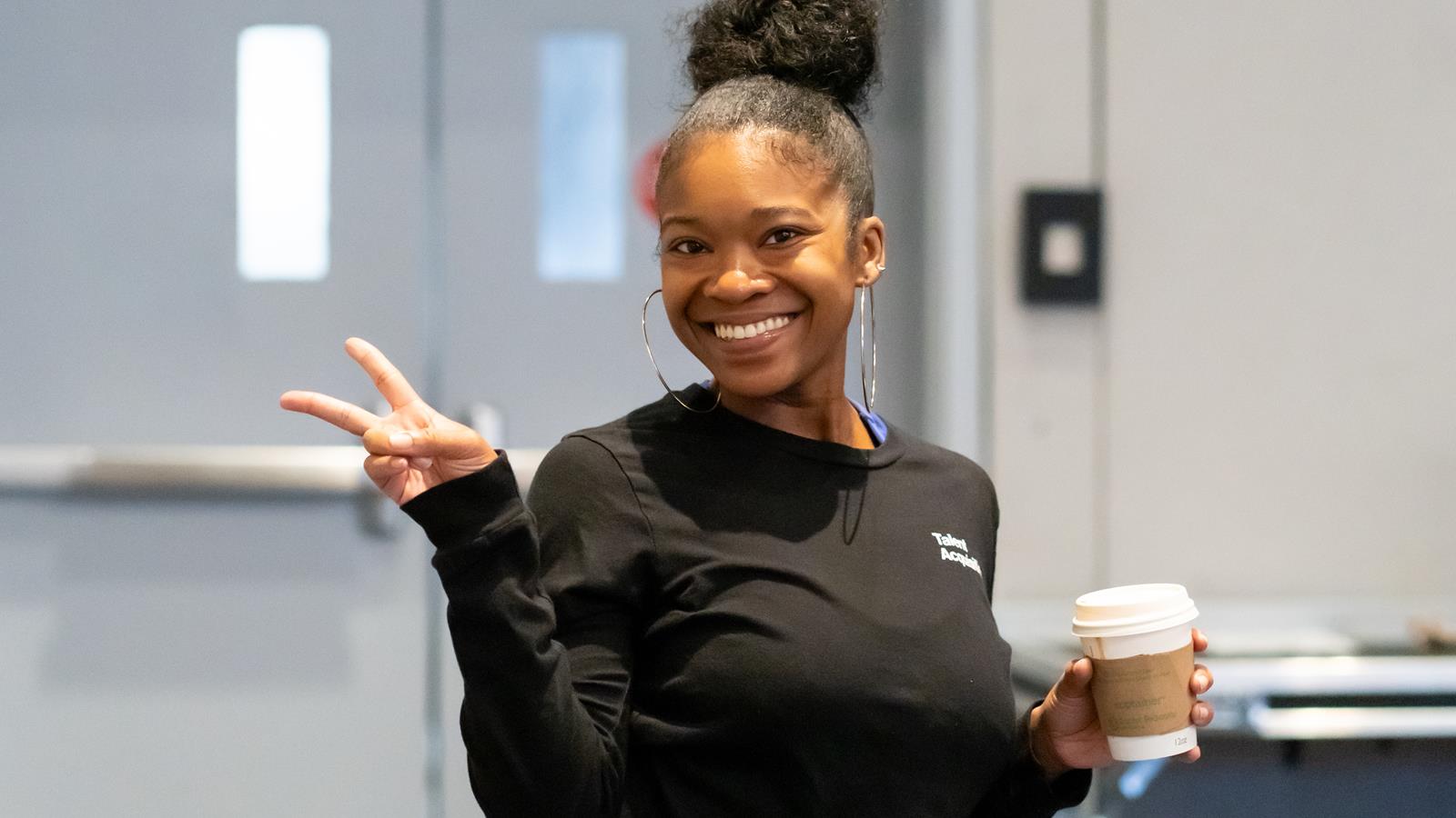 Verizon employee smiling.