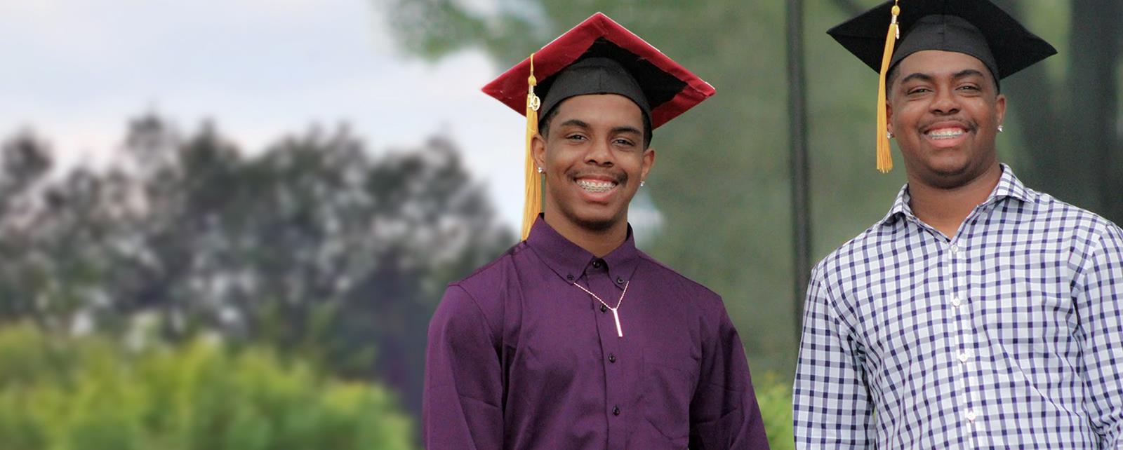 New Graduates Wearing Caps And Tassels