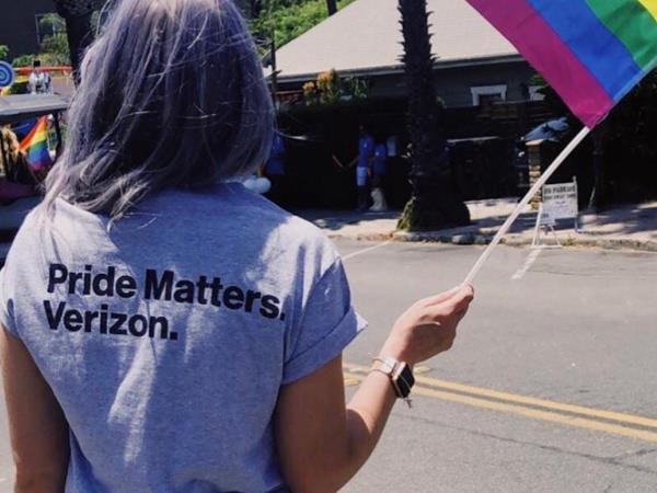 Verizon Employee At Pride Parade