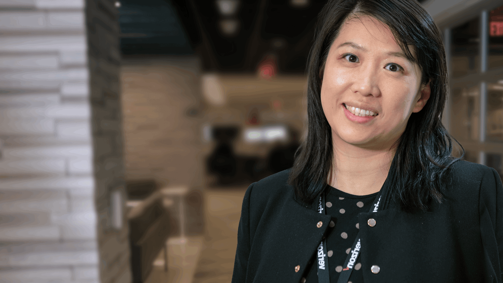 Smiling Employee In Open Office Space