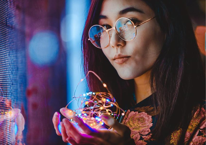 Girl holding lights